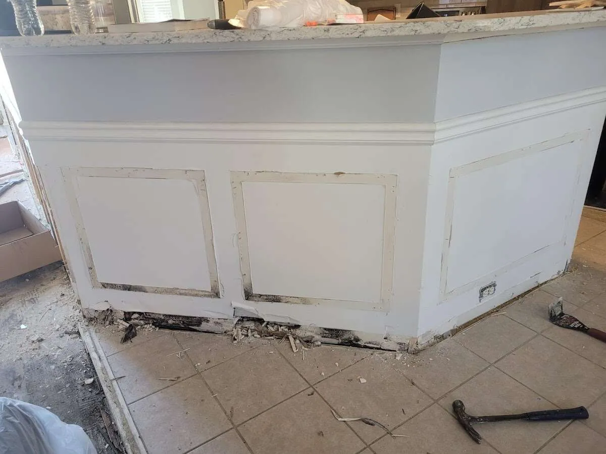 Water damage and mold on kitchen during Storm Damage Restoration in Cuero
